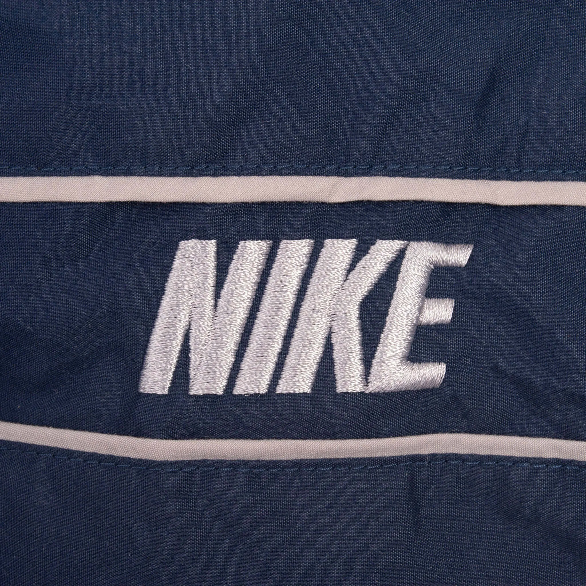 VINTAGE NIKE CLASSIC SWOOSH BLUE NYLON TRACK PANTS 2000S SIZE LARGE